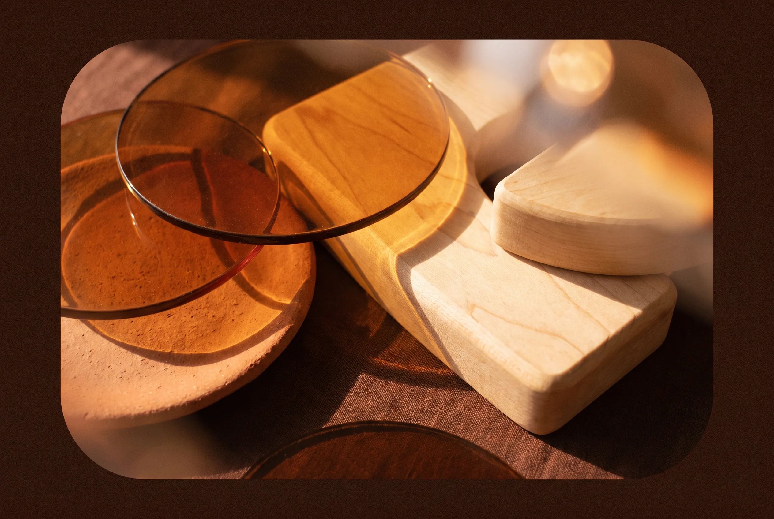 Abstract amber glass and maple wood composition